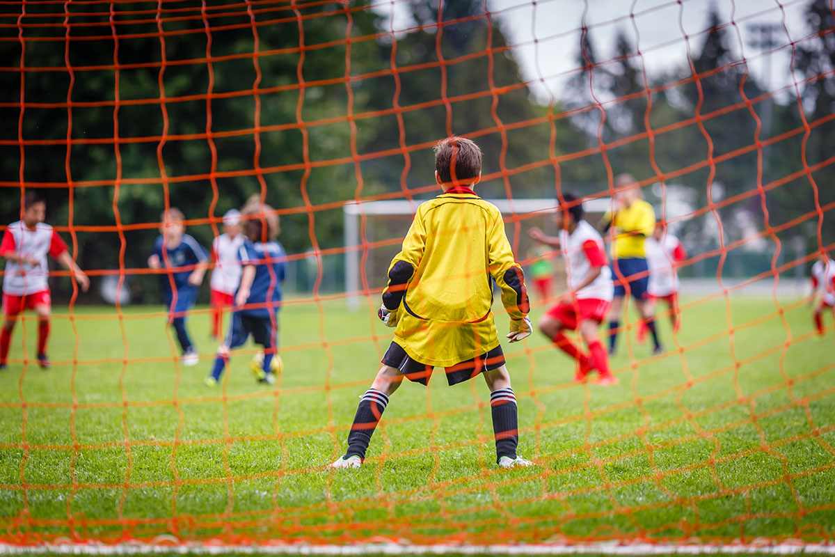 children playing soccer